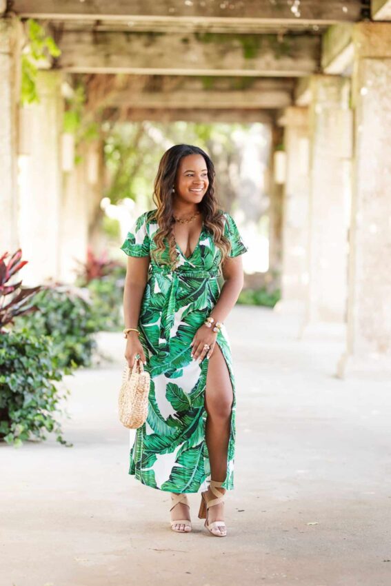 How To Shop for Outfits Under $100 featured by top US fashion blog, Glamorous Versatility: image of a woman wearing a palm print maxi dress
