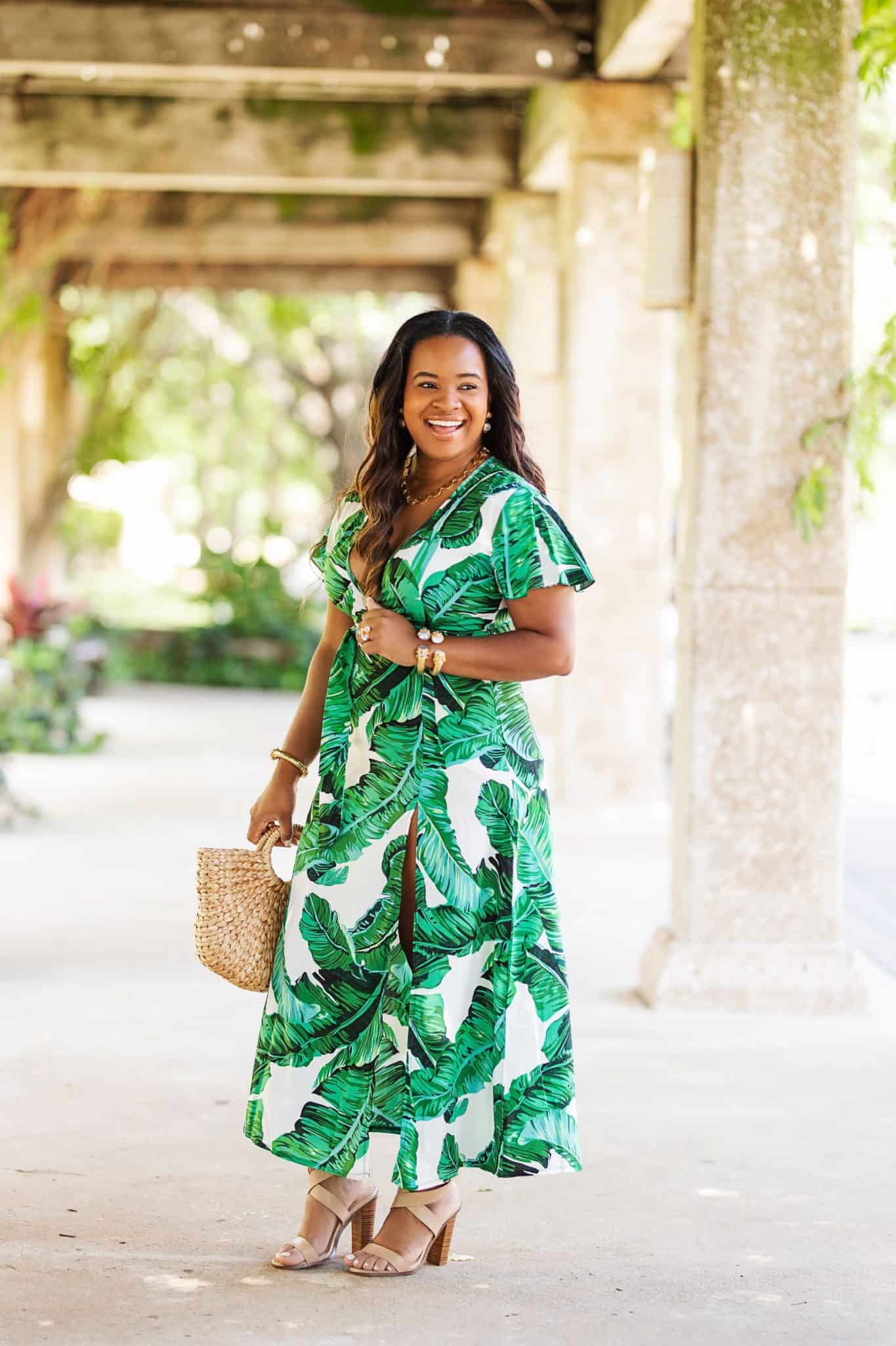 How To Shop for Outfits Under $100 featured by top US fashion blog, Glamorous Versatility: image of a woman wearing a palm print maxi dress