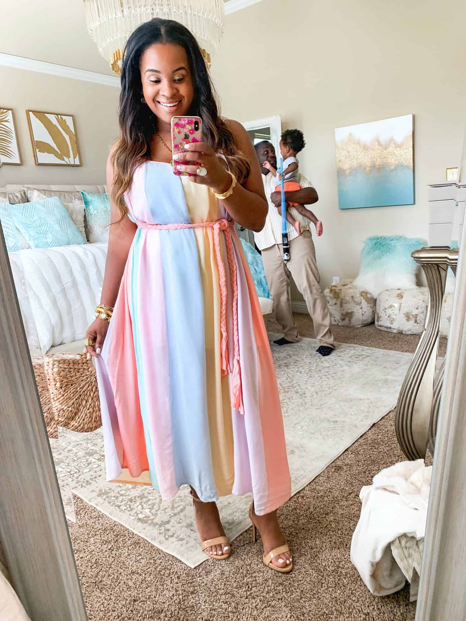 Red Dress Boutique summer favorites featured by top US fashion blog, Glamorous Versatility: image of a woman wearing a rainbow maxi dress