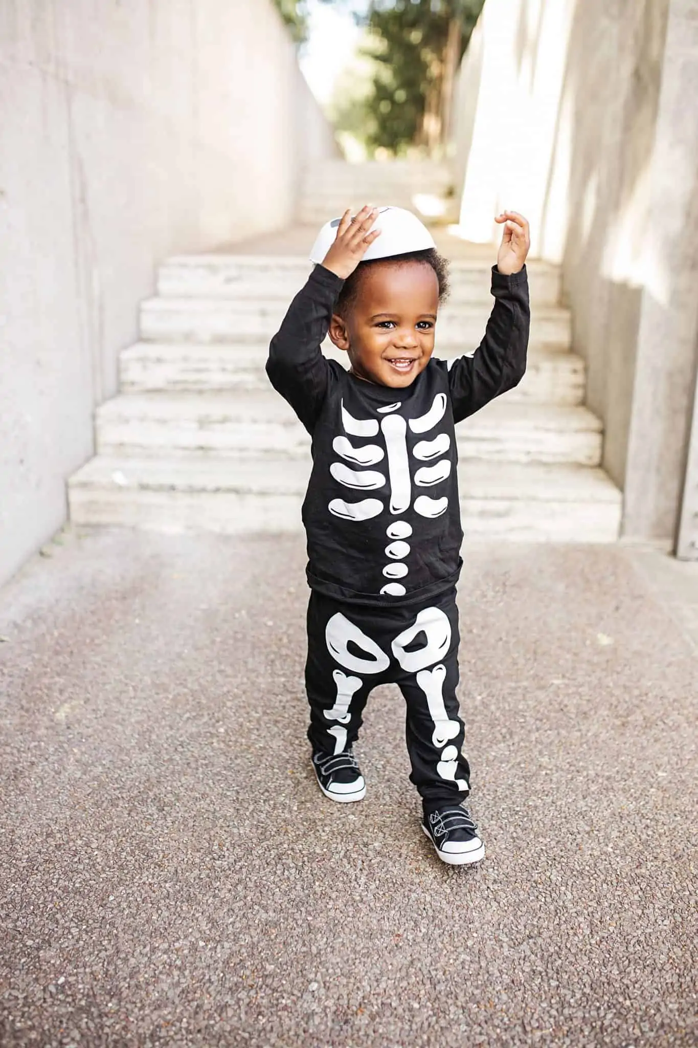 Family Halloween Costume Ideas Under $50 featured by top US life and style blog, Glamorous Versatility: image of a family wearing skeleton costumes