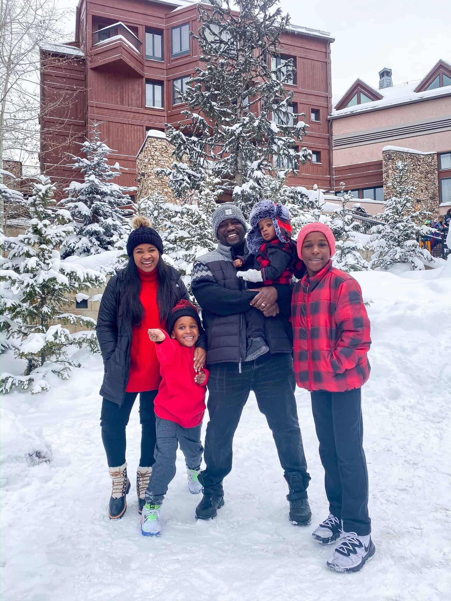 How to Plan a Ski Trip for Your Family by popular lifestyle blog, Glamorous Versatility: image of a family at Beaver Creek Ski Resort in Avon, Colorado. 