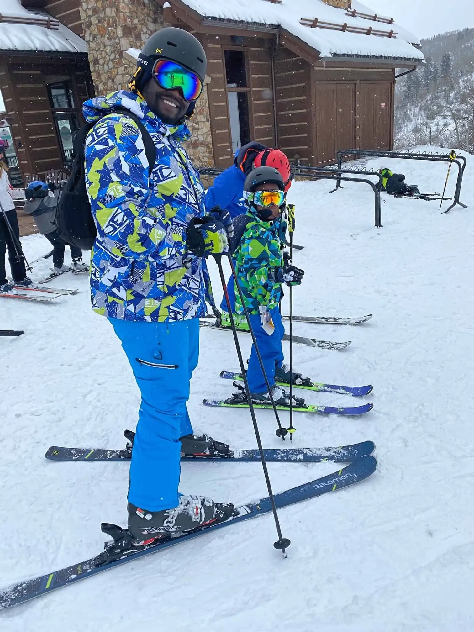 How to Plan a Ski Trip for Your Family by popular lifestyle blog, Glamorous Versatility: image of a dad and son skiing at Beaver Creek Ski Resort in Avon, Colorado. 