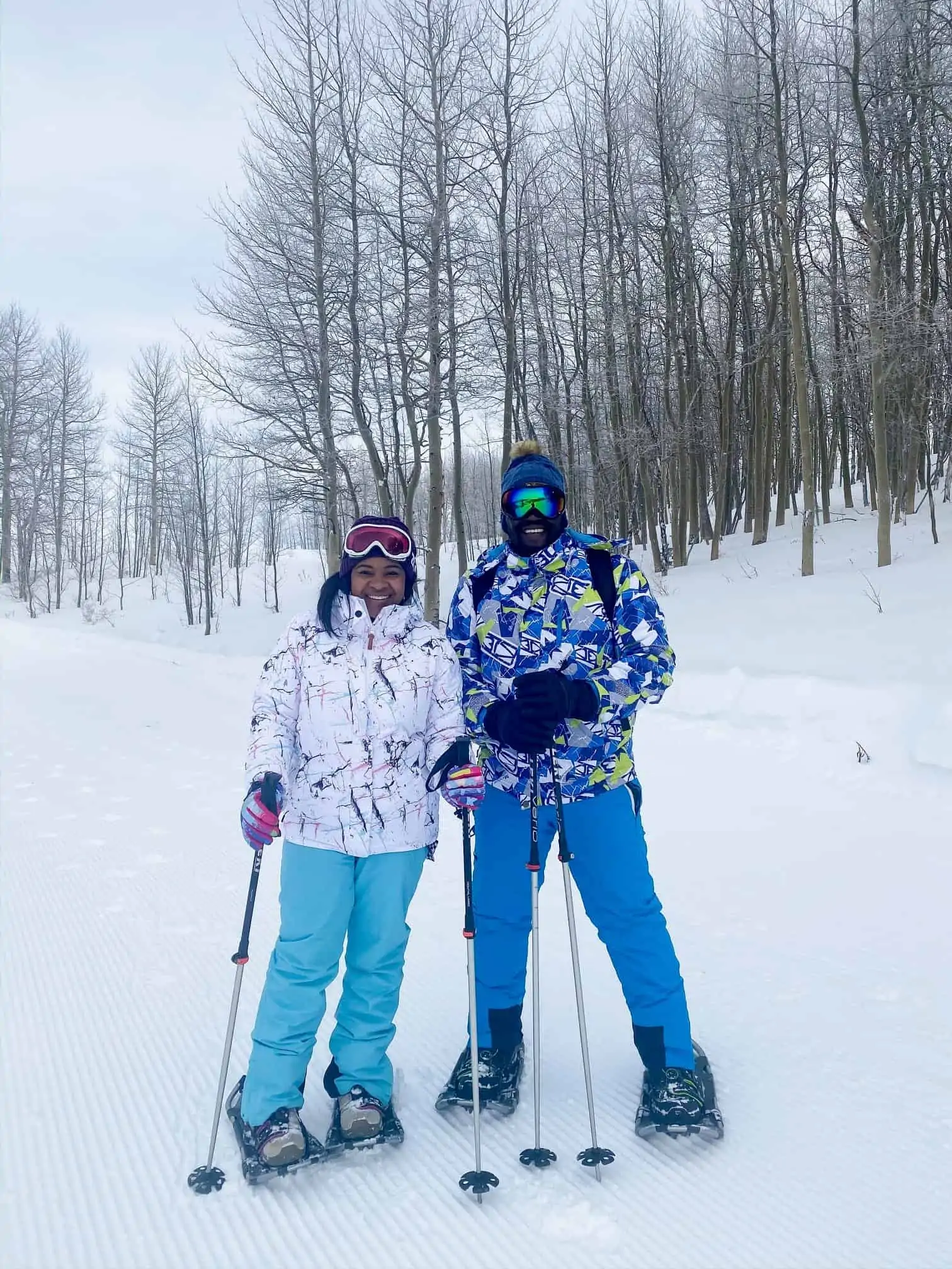How to Plan a Ski Trip for Your Family by popular lifestyle blog, Glamorous Versatility: image of a husband and wife skiing at Beaver Creek Ski Resort in Avon, Colorado. 