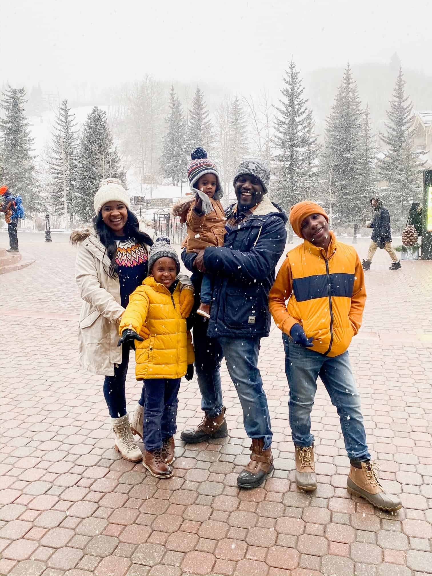 How to Plan a Ski Trip for Your Family by popular lifestyle blog, Glamorous Versatility: image of a family at Beaver Creek Ski Resort in Avon, Colorado. 