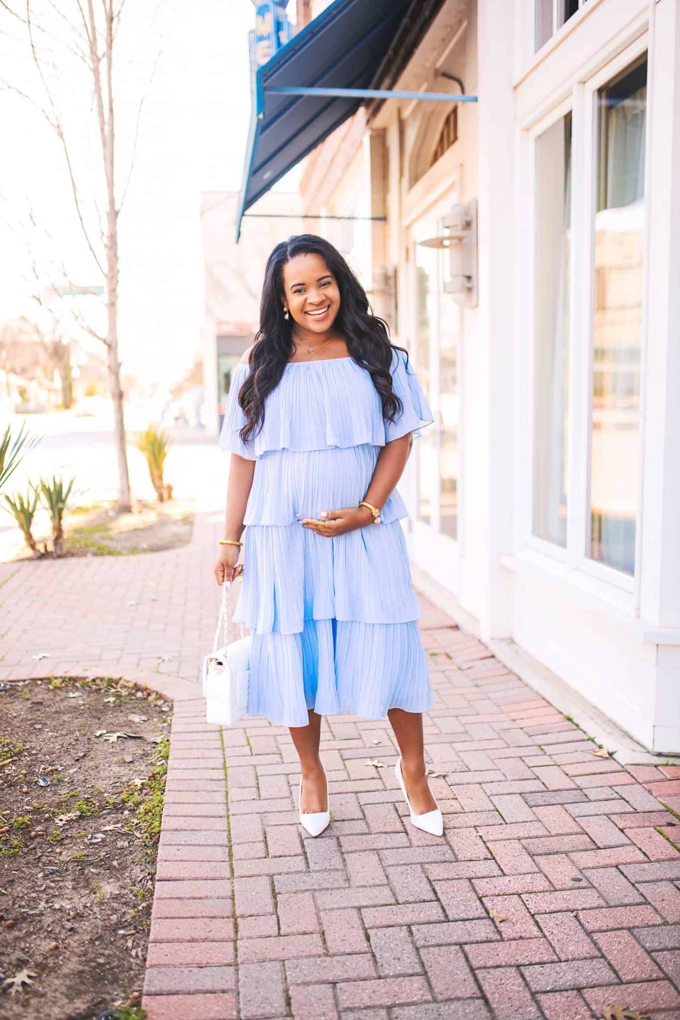 Baby Shower Dress Ideas by popular Dallas fashion blog, Glamorous Versatility: image of a woman wearing a blue tiered dress. 