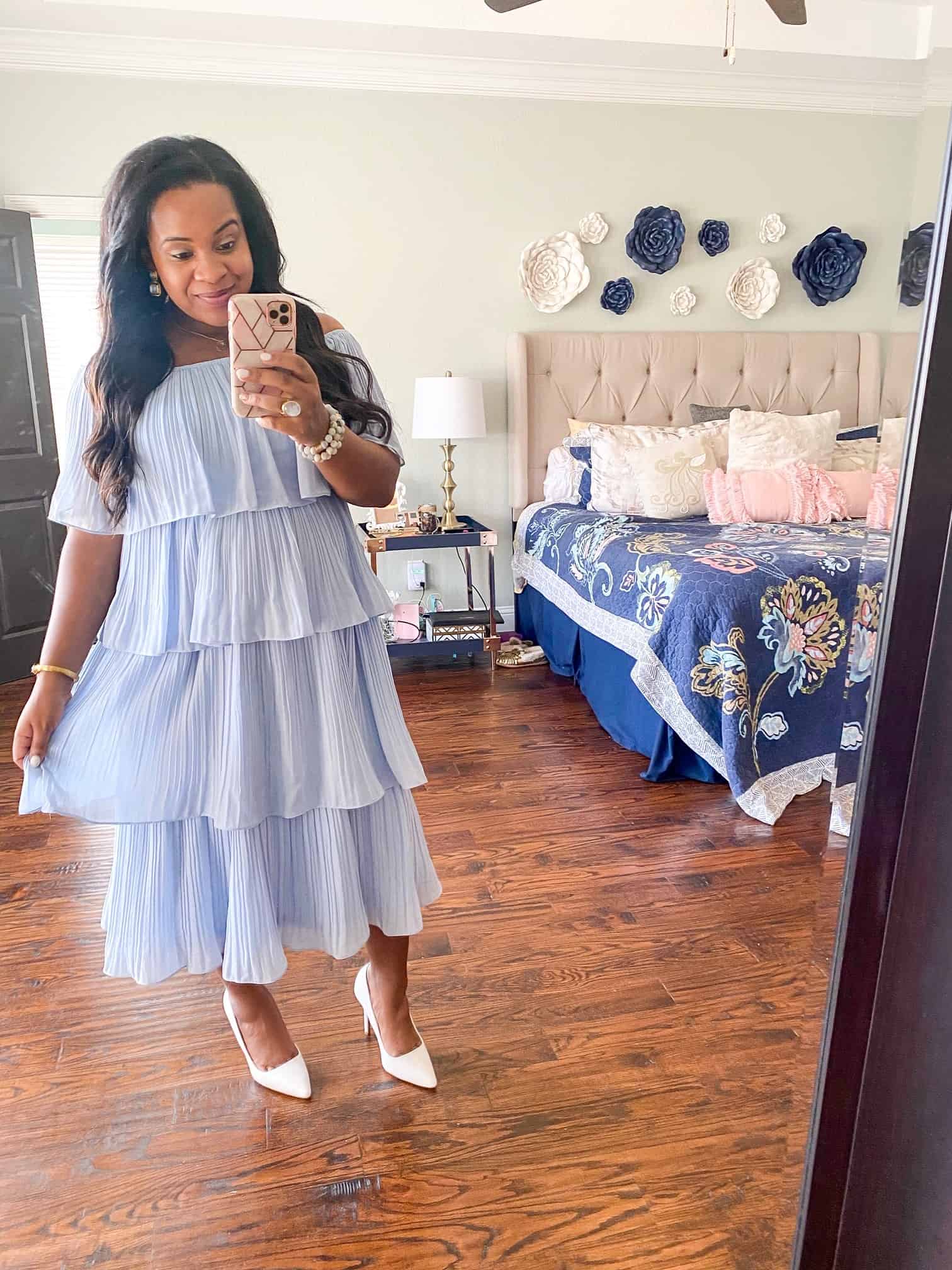 Baby Shower Dress Ideas by popular Dallas fashion blog, Glamorous Versatility: image of a woman wearing a blue tiered midi dress. 