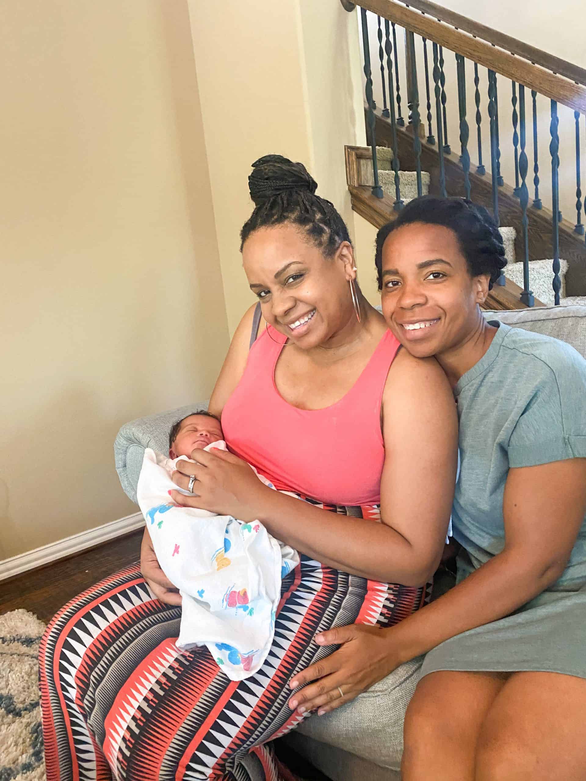 Birth Story by popular Dallas motherhood blog, Glamorous Versatility: image of two women holding a new born baby boy. 